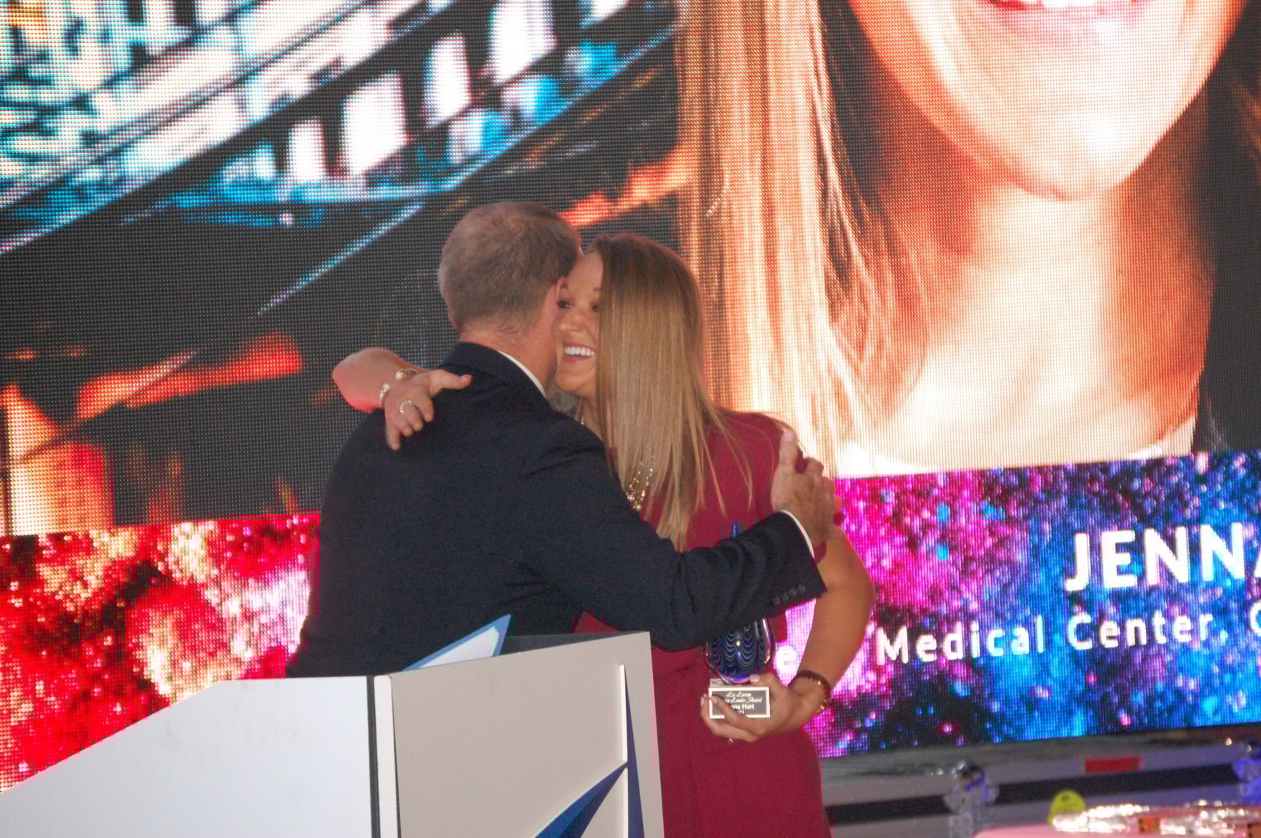 Justin Strader congratulating Jenna Hart, winner of the Liz Larson award